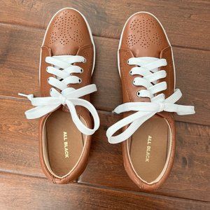 All Black  Wing Tip Trainer